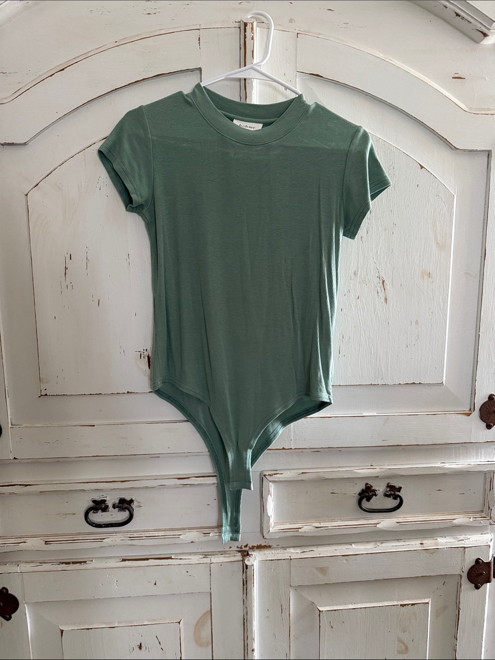 Women’s Green Short-Sleeve One-Piece Bodysuit